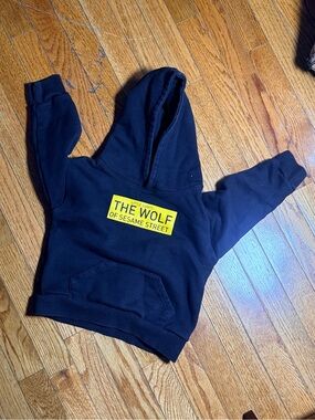Kids Black Hoodie with 'The Wolf of Sesame Street' Graphic